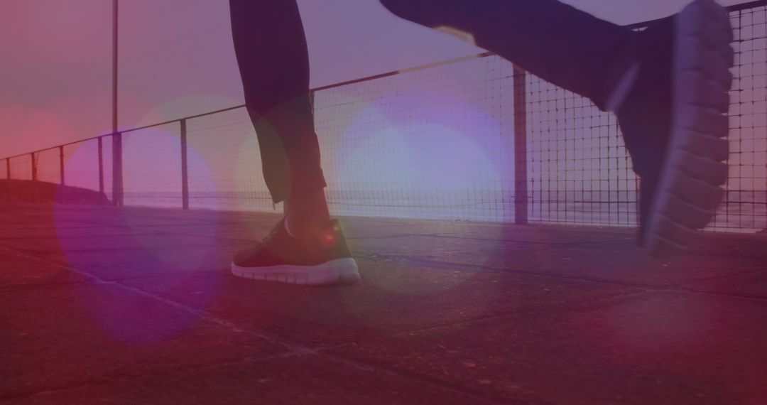 Silhouette of Athlete Running by Seaside at Sunset