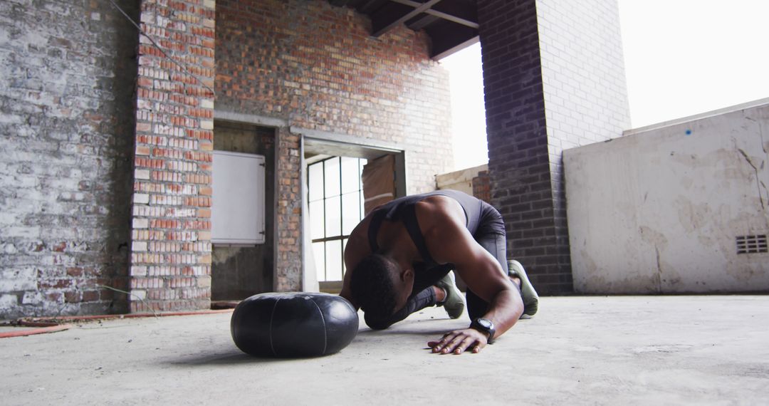 Exhausted Athlete Resting After Intense Workout in Abandoned Building - Free Images, Stock Photos and Pictures on Pikwizard.com