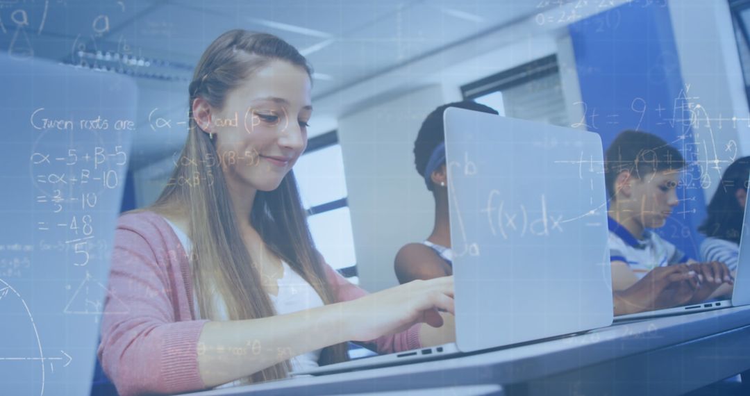 Schoolchildren Using Laptops with Mathematical Equations Overlay