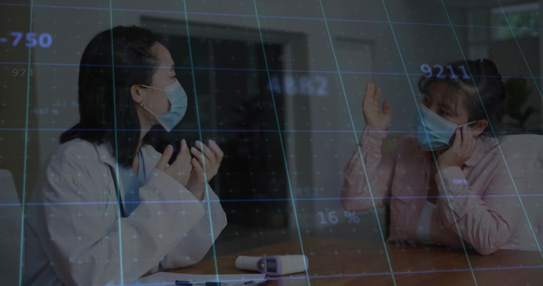 Physician and Patient Consultation with Overlayed Data Graphics