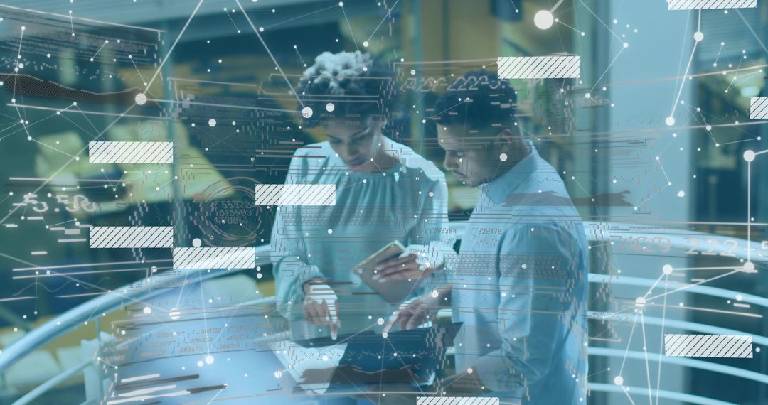 Professionals Collaborating Over Laptop in High-Tech Atrium with Digital Network Overlay