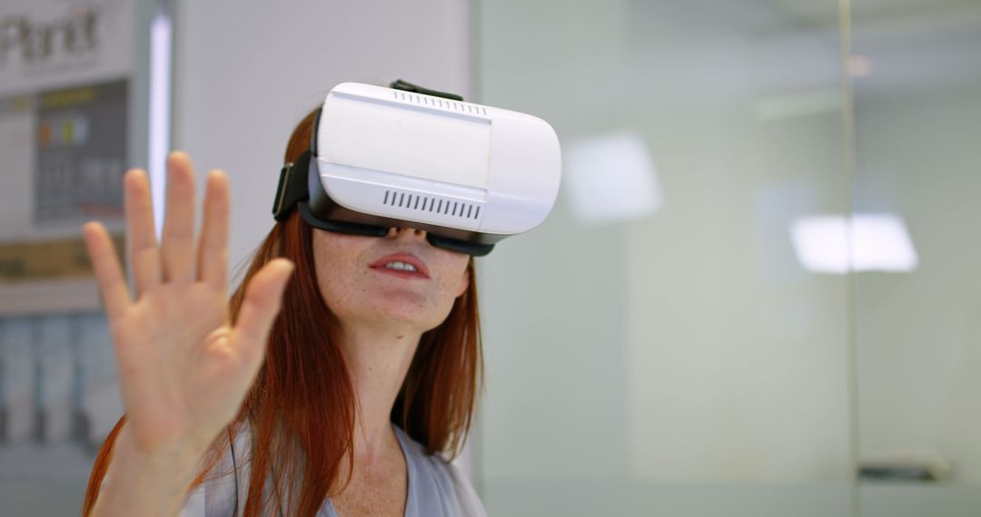 Businesswoman Experiencing Virtual Reality in Office Technology Setting