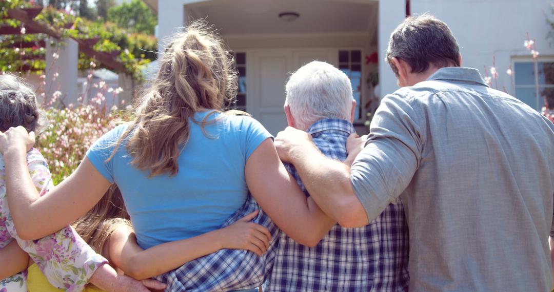 Rear View of Multi-generation Family Embracing Outside Home Entrcance - Free Images, Stock Photos and Pictures on Pikwizard.com