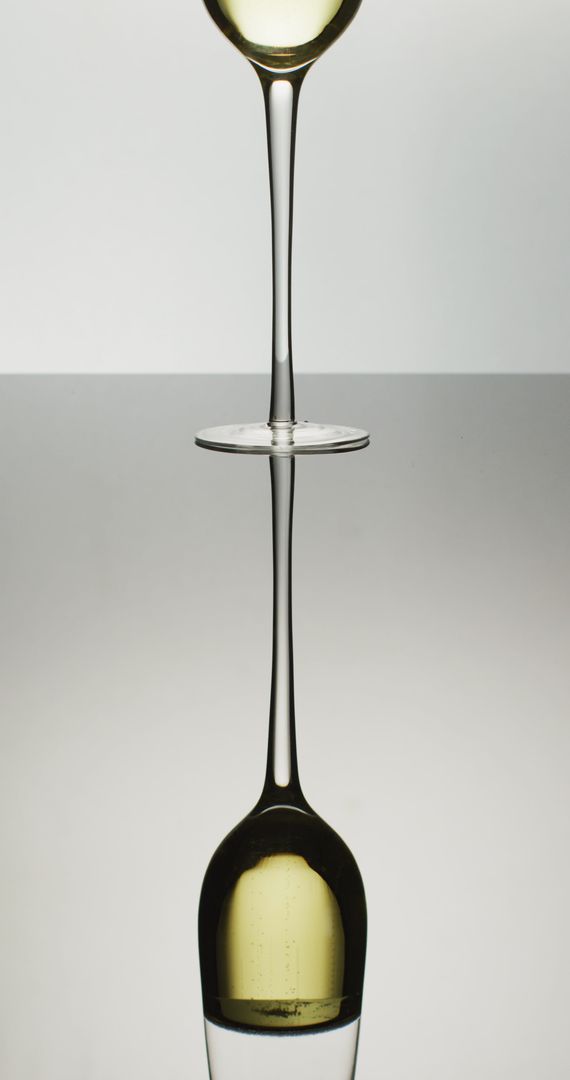 Elegant Tulip Glass with Champagne Reflection