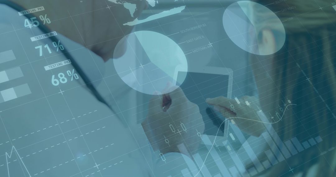 Business Analysts Reviewing Financial Data on Tablet in Office