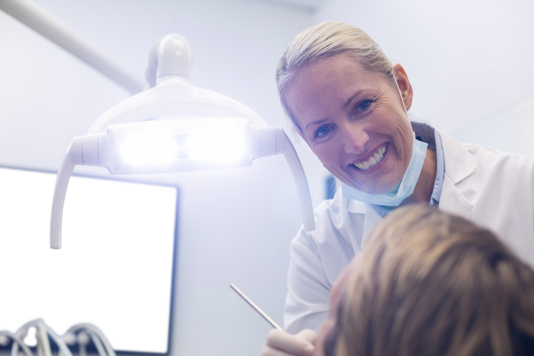 Transparent Smiling Dentist Examining Patient with Dental Tools - Download Free Stock Images Pikwizard.com