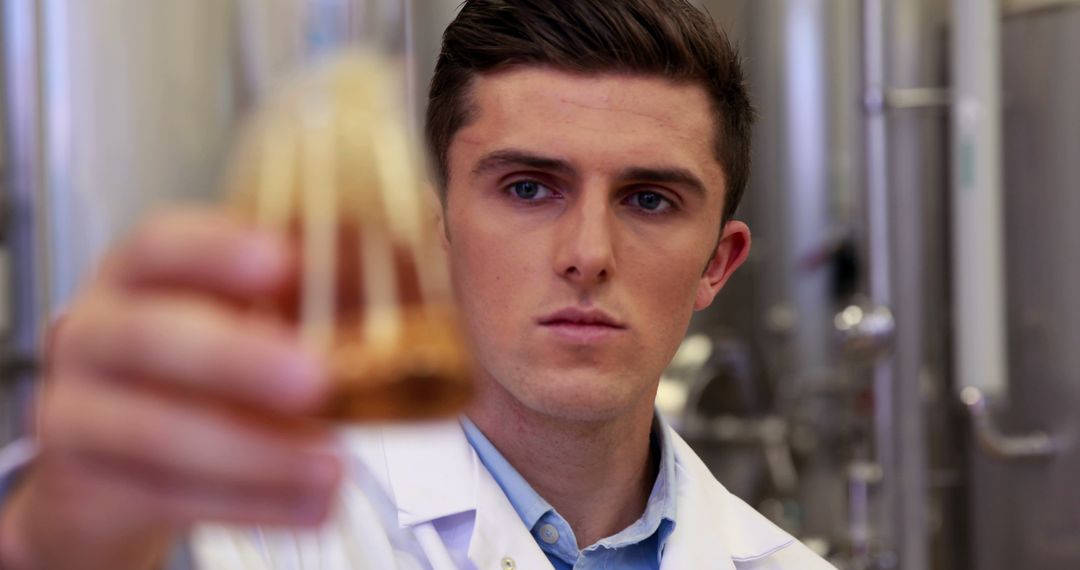 Scientist Examining Sample in Laboratory - Free Images, Stock Photos and Pictures on Pikwizard.com