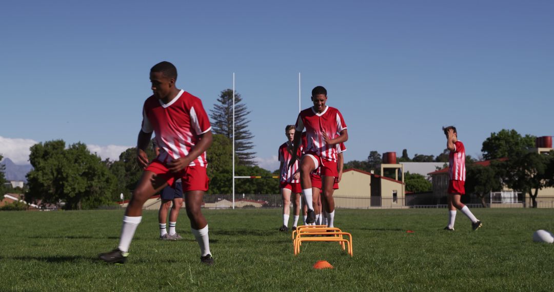 Youth Soccer Team Training on Field with Cones and Mini Goals - Free Images, Stock Photos and Pictures on Pikwizard.com