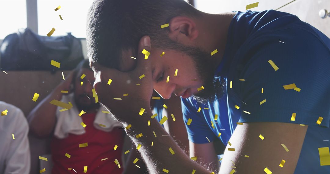 Exhausted Football Player in Locker Room with Falling Confetti
