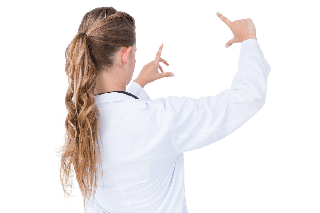 Female Doctor Creating Transparent Finger Frame Gesture at Countryside