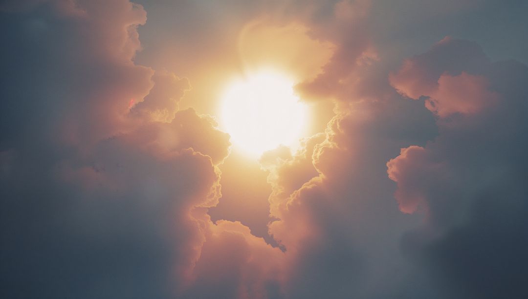 Sunlight Breaking Through Dramatic Cumulus Clouds