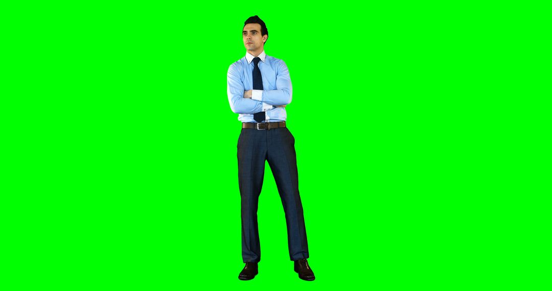 Confident Businessman Standing with Arms Crossed on Green Screen - Free Images, Stock Photos and Pictures on Pikwizard.com