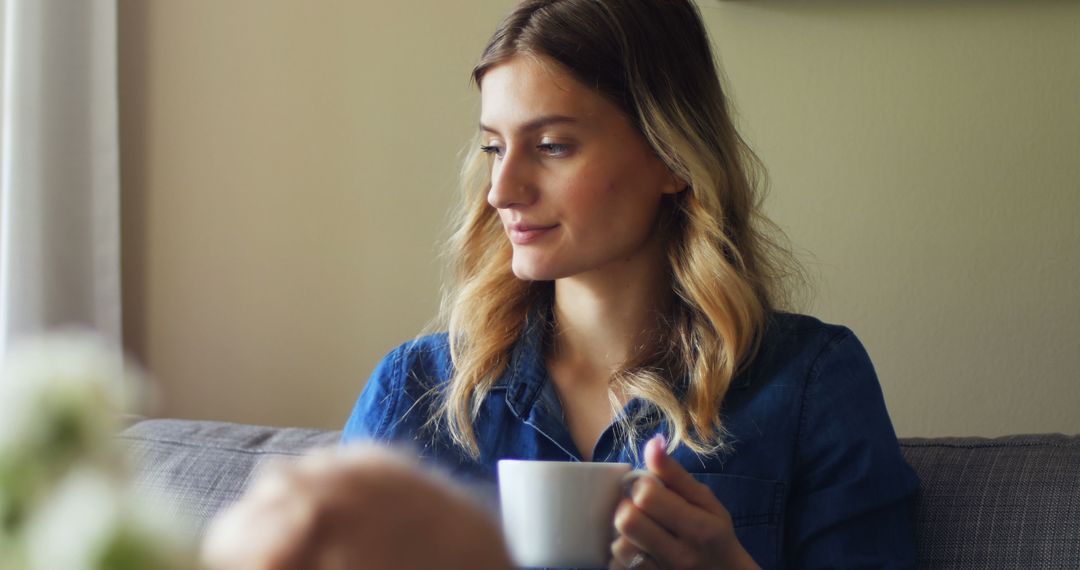 Thoughtful Young Woman Enjoying Morning Coffee at Home - Free Images, Stock Photos and Pictures on Pikwizard.com