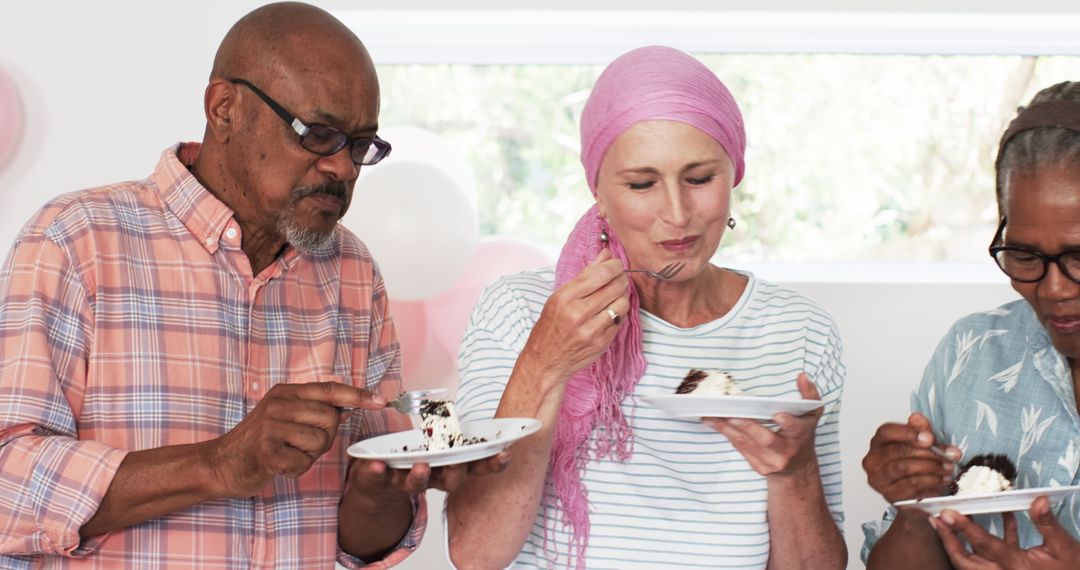 Senior Friends Enjoying Cake and Conversation Together