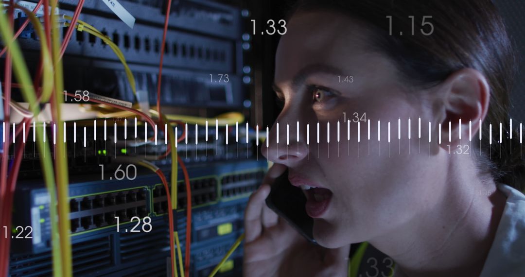 Female IT Engineer Communicating in Data Server Room