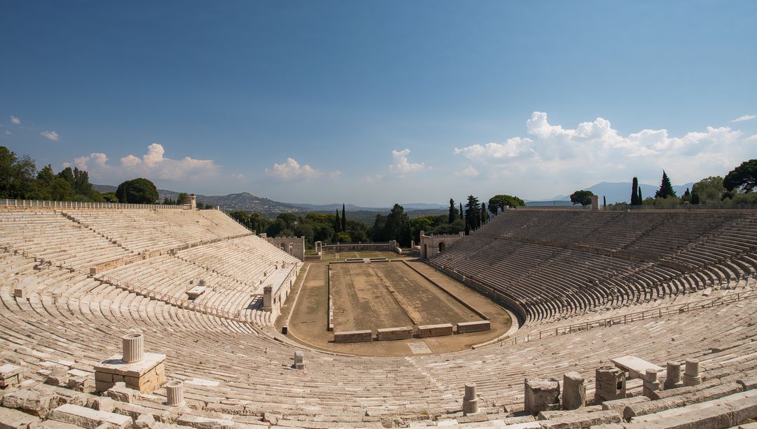 Panoramic Ancient Roman Amphitheatre with Stone Seating and Central Arena on Hilltop