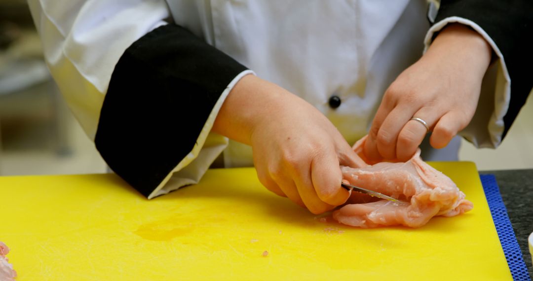 Chef Preparing Raw Chicken on Cutting Board - Free Images, Stock Photos and Pictures on Pikwizard.com