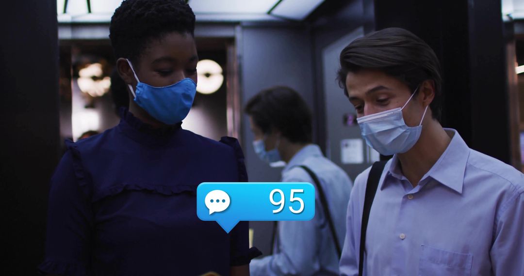 Professionals Wearing Masks Checking Chat Alert in Elevator