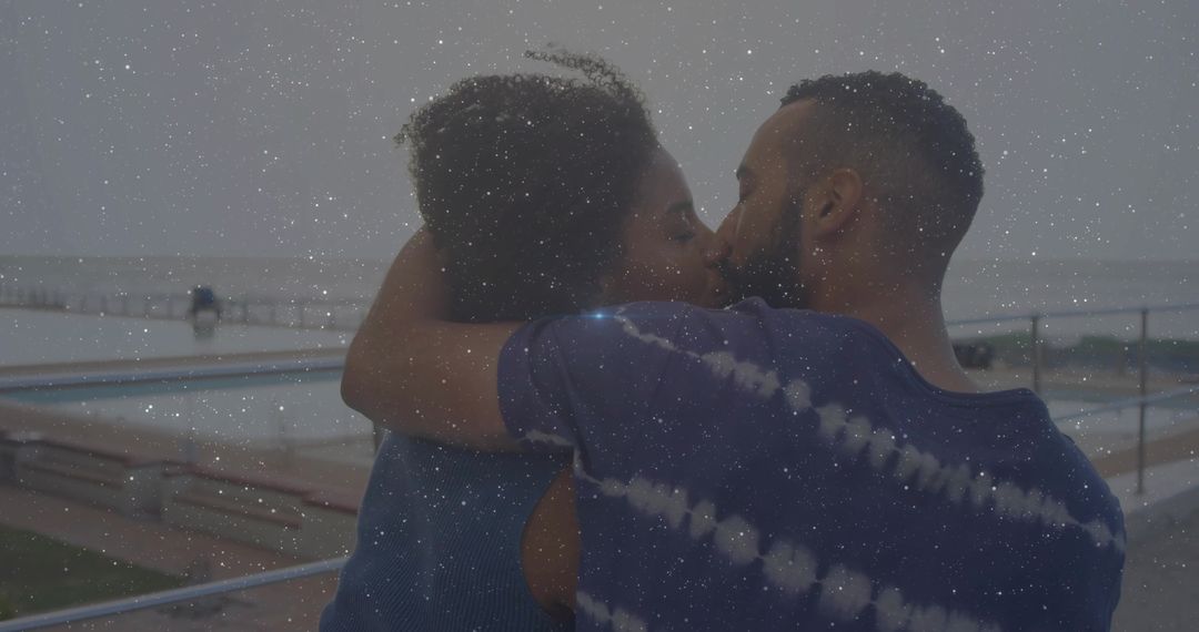 Couple Embracing on Boardwalk with Starry Overlay