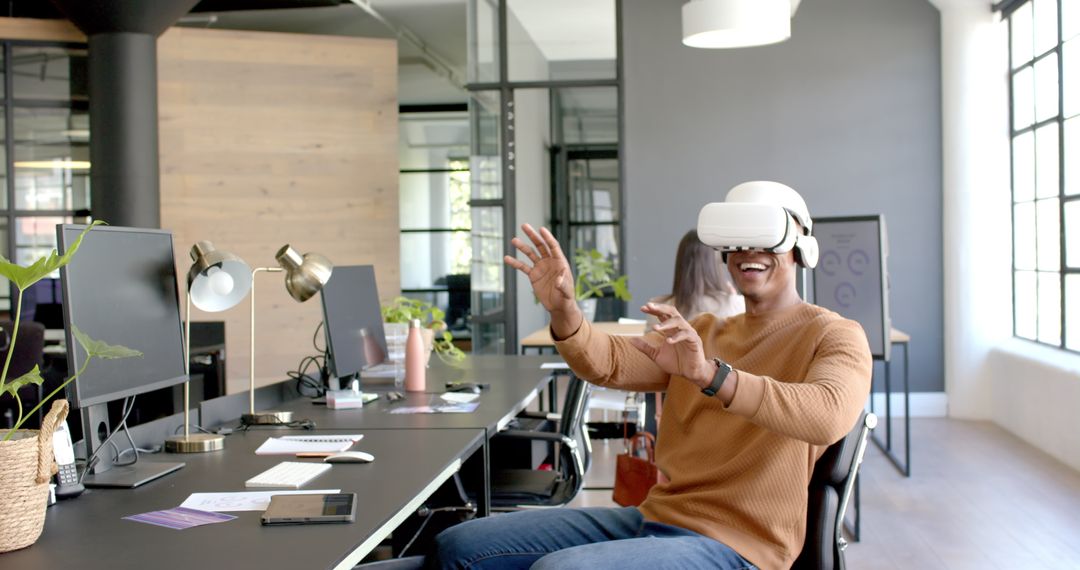 Enthusiastic Professional Experiencing Virtual Reality in Office