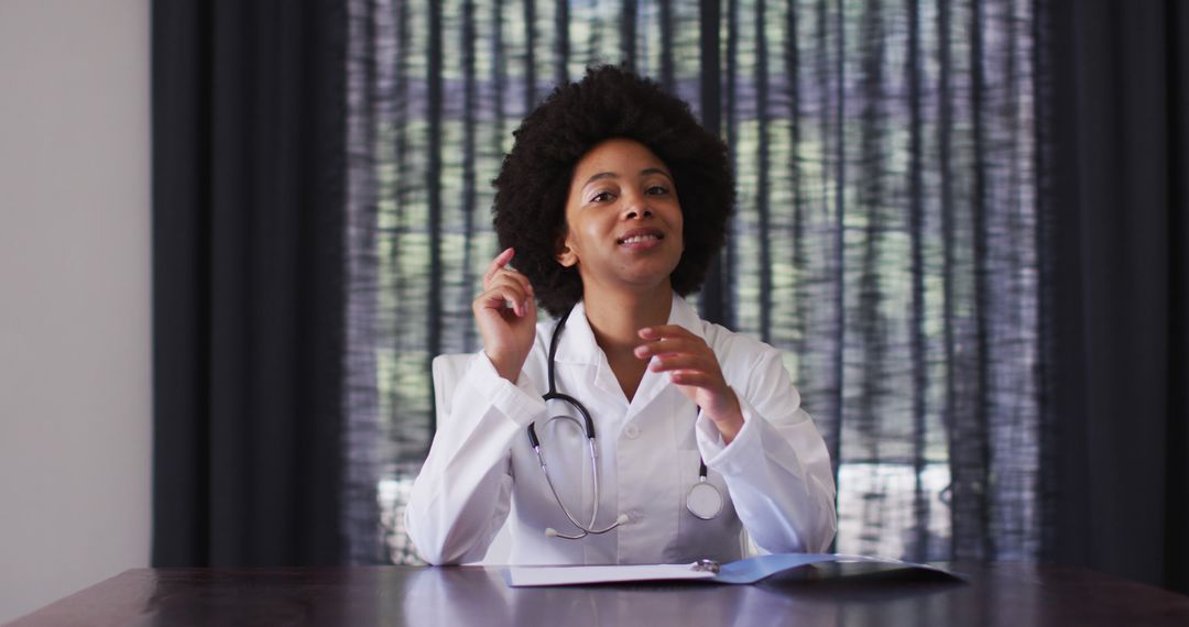 Confident Female Doctor Discussing Patient Care Plans - Free Images, Stock Photos and Pictures on Pikwizard.com