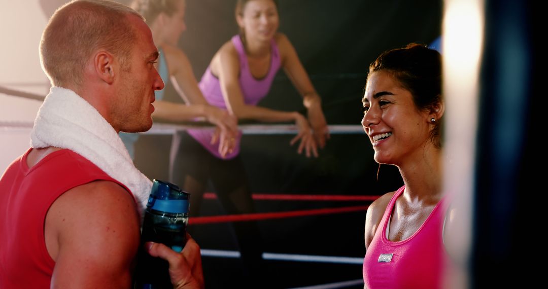 Boxing Coach and Female Trainee Smiling in Gym - Free Images, Stock Photos and Pictures on Pikwizard.com