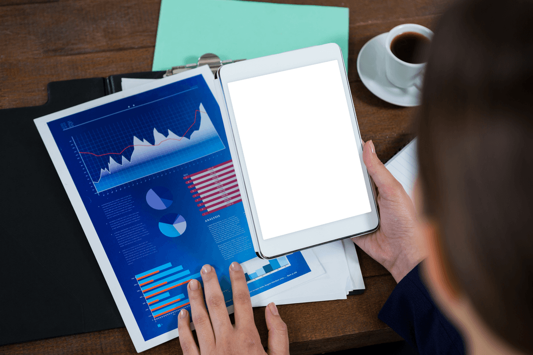 Transparent Tablet Screen with Business Documents and Coffee