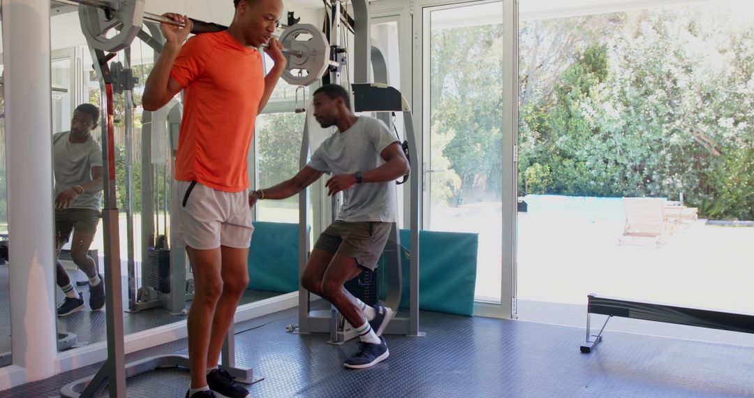 Man Resting Post-Workout in Home Gym Looking Exhausted