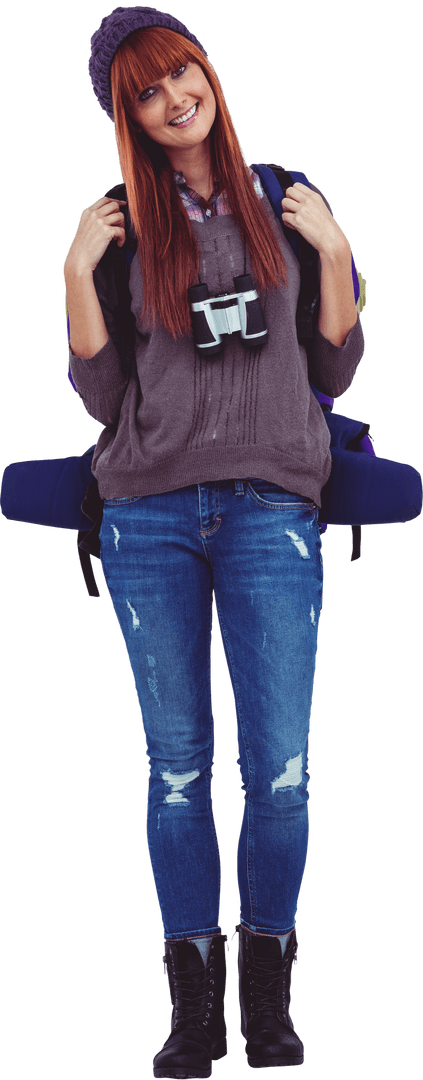 Happy Backpacker Exploring with Binoculars and Warm Beanie