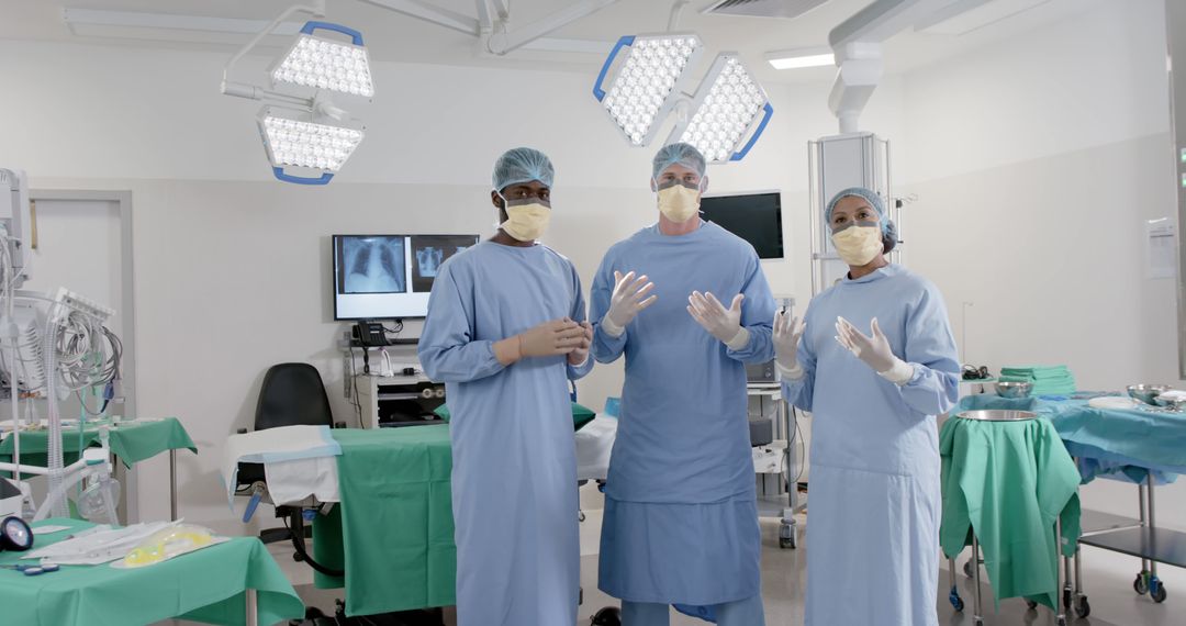 Medical Team Preparing for Surgery in Modern Operating Room - Free Images, Stock Photos and Pictures on Pikwizard.com