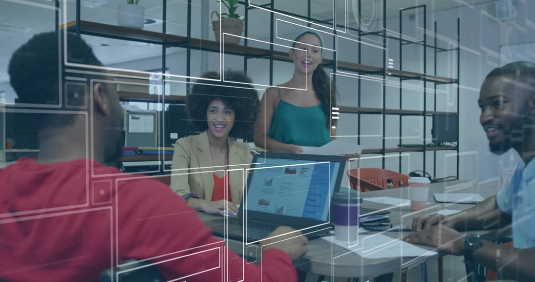 Diverse Business Team Collaborating on Technology-Driven Project