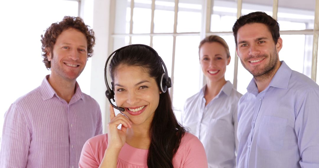 Smiling Customer Service Team in Call Center - Free Images, Stock Photos and Pictures on Pikwizard.com