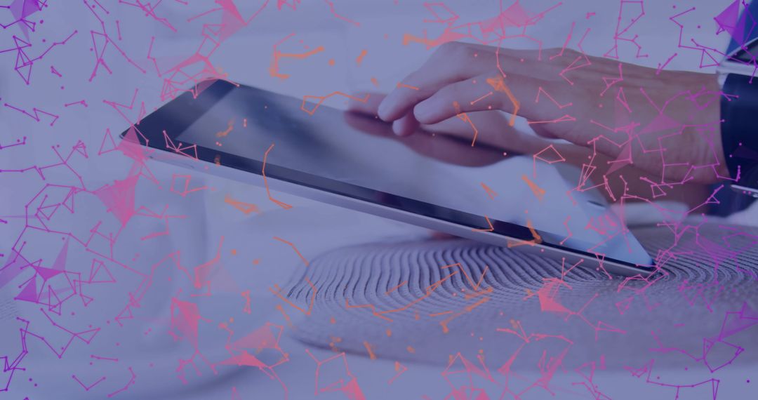 Hand Interacting with Tablet Device on Desk with Network Overlay