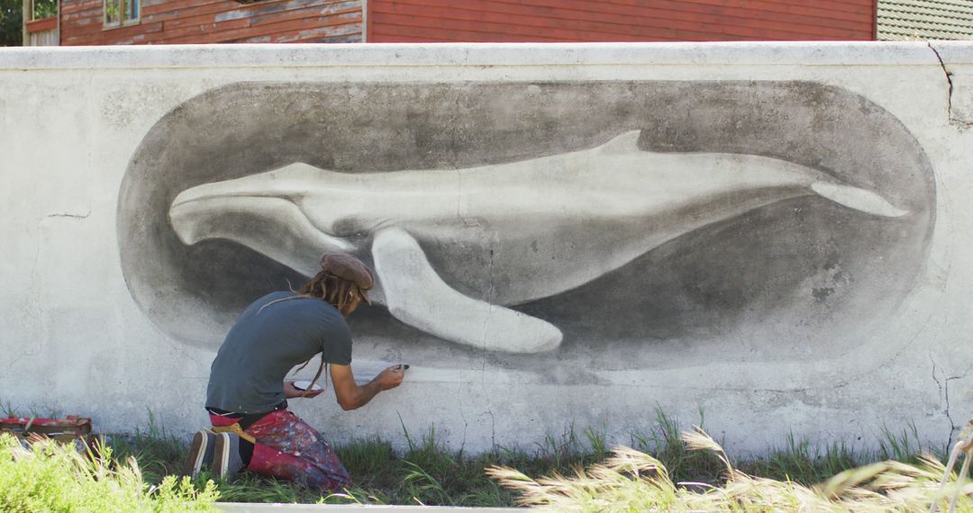 Street Artist Creating Whale Mural on Urban Wall - Free Images, Stock Photos and Pictures on Pikwizard.com