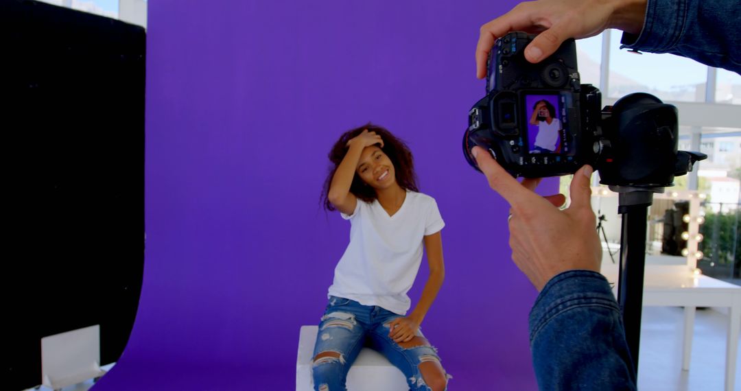 Young Girl Posing for Professional Photographer in Studio - Free Images, Stock Photos and Pictures on Pikwizard.com