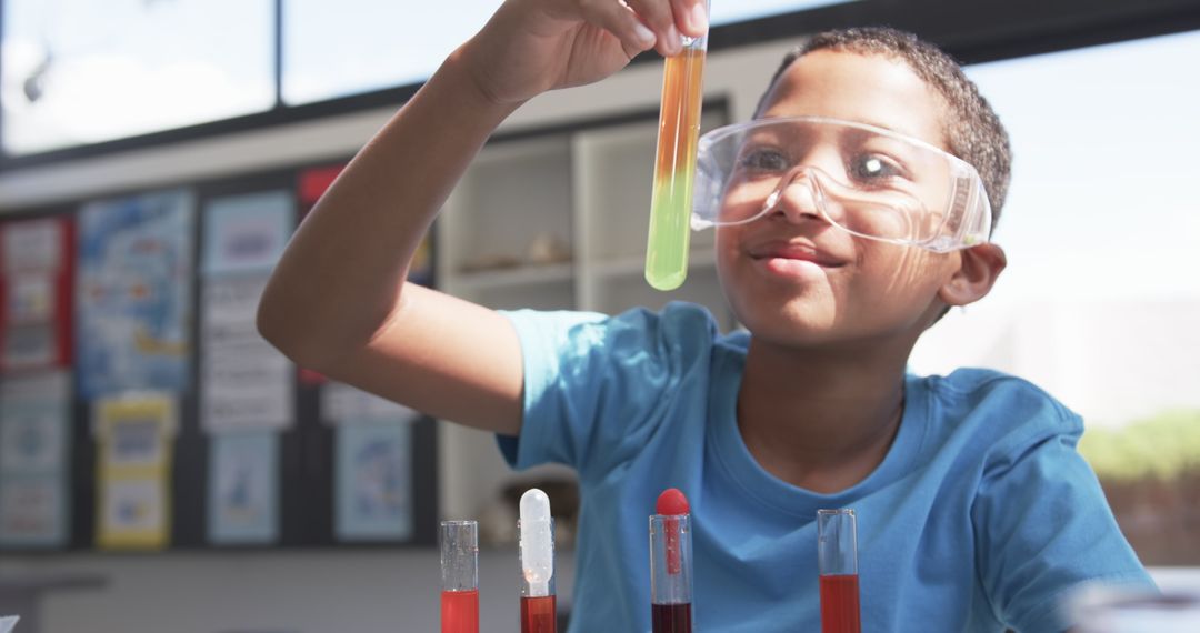 Enthusiastic Student Exploring Chemistry with Colorful Test Tubes