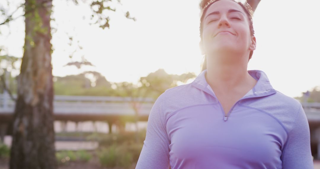 Woman Enjoying Fresh Morning Air During Outdoor Exercise - Free Images, Stock Photos and Pictures on Pikwizard.com