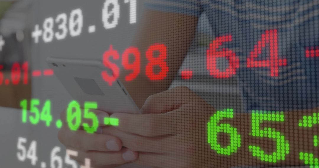 Analyzing Stock Market Trends with Smartphone in Modern Office