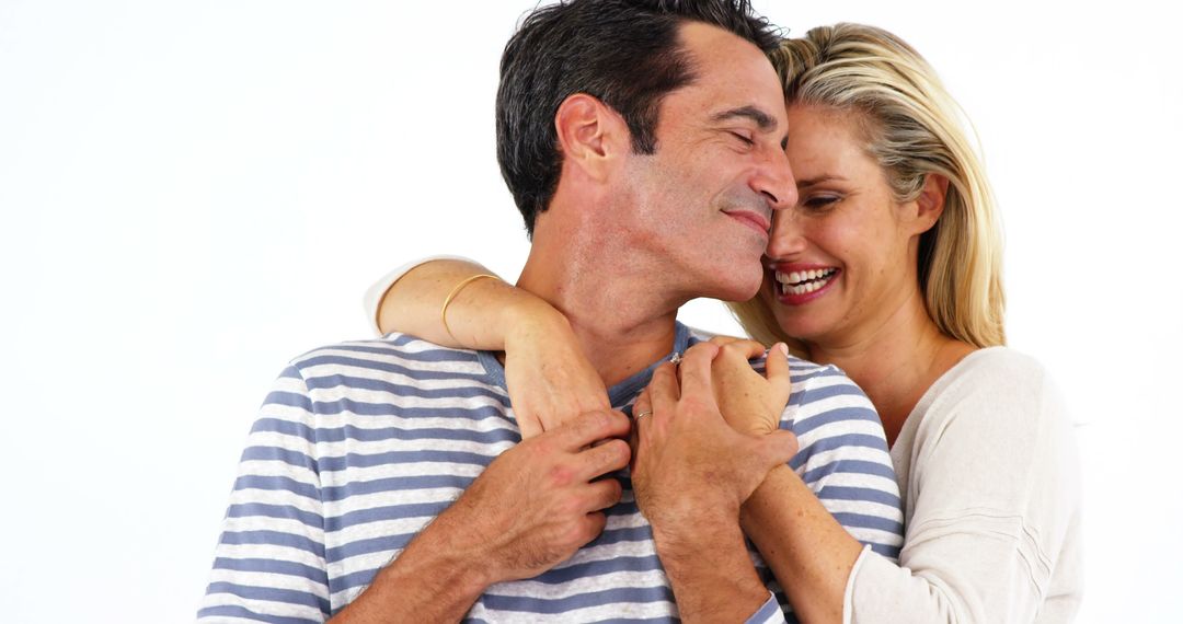 Affectionate Couple Smiling and Embracing Each Other - Free Images, Stock Photos and Pictures on Pikwizard.com