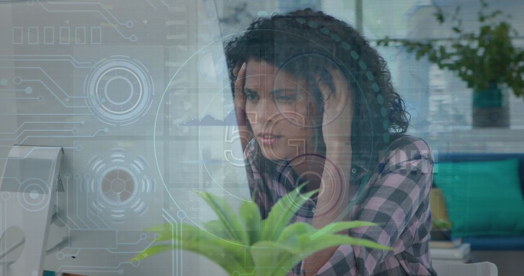 Focused Woman in Tech Environment with Data Processing Graphics