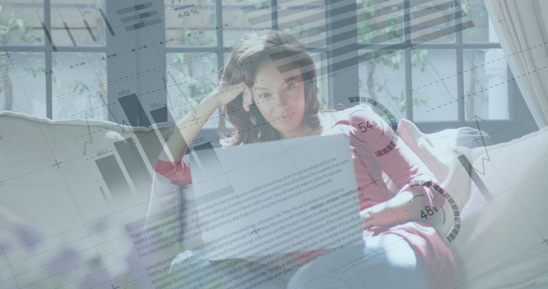 Woman Casually Analyzing Data on Laptop at Home