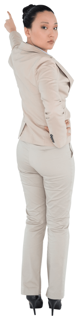 Serious Asian Businesswoman Pointing with Determination on Transparent Background