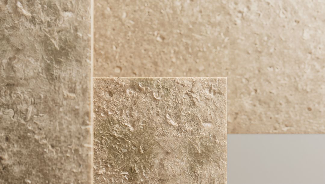 Textured Beige Plaster Panels Layering with Pale Gray Accent Strip for Minimalist Design