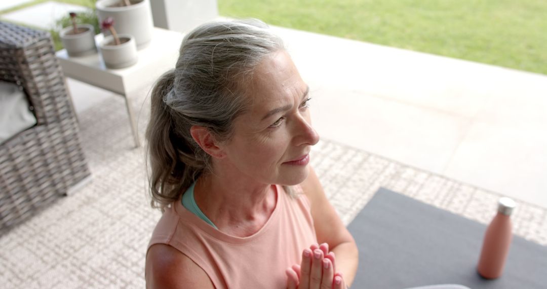 Content Mature Woman Practicing Yoga Outdoors