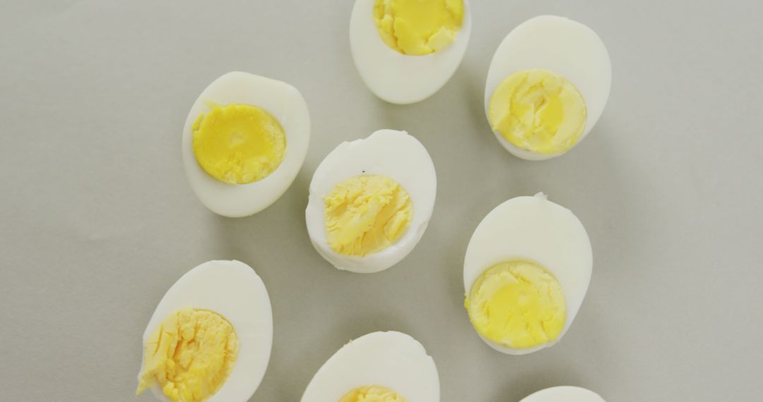 Slices of Hard-Boiled Eggs With Yellow Yolks on Light Surface - Free Images, Stock Photos and Pictures on Pikwizard.com