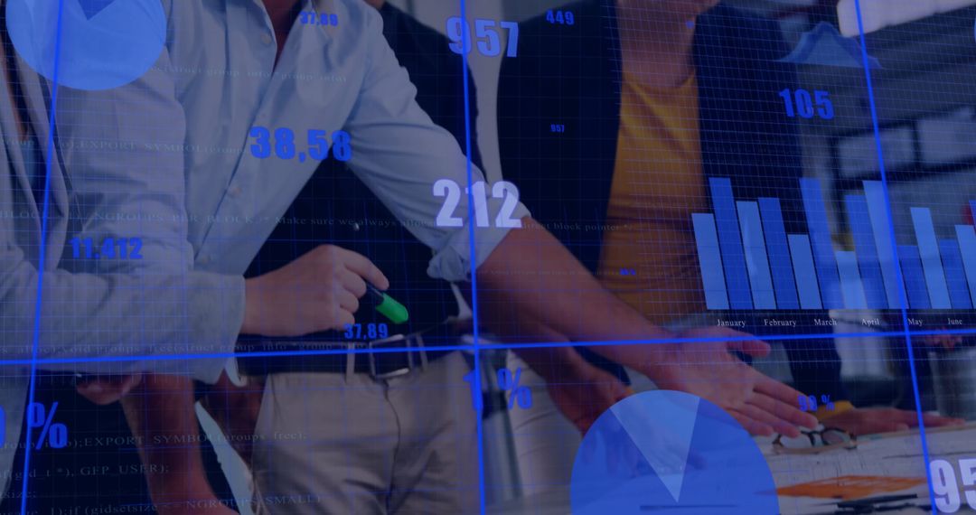 Business Team Collaborating on Financial Data Analysis in Office