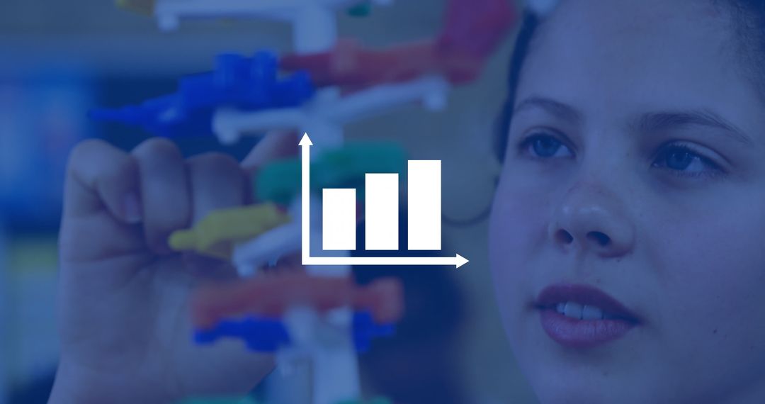 Focused Student Assembling Molecular Model in Science Class