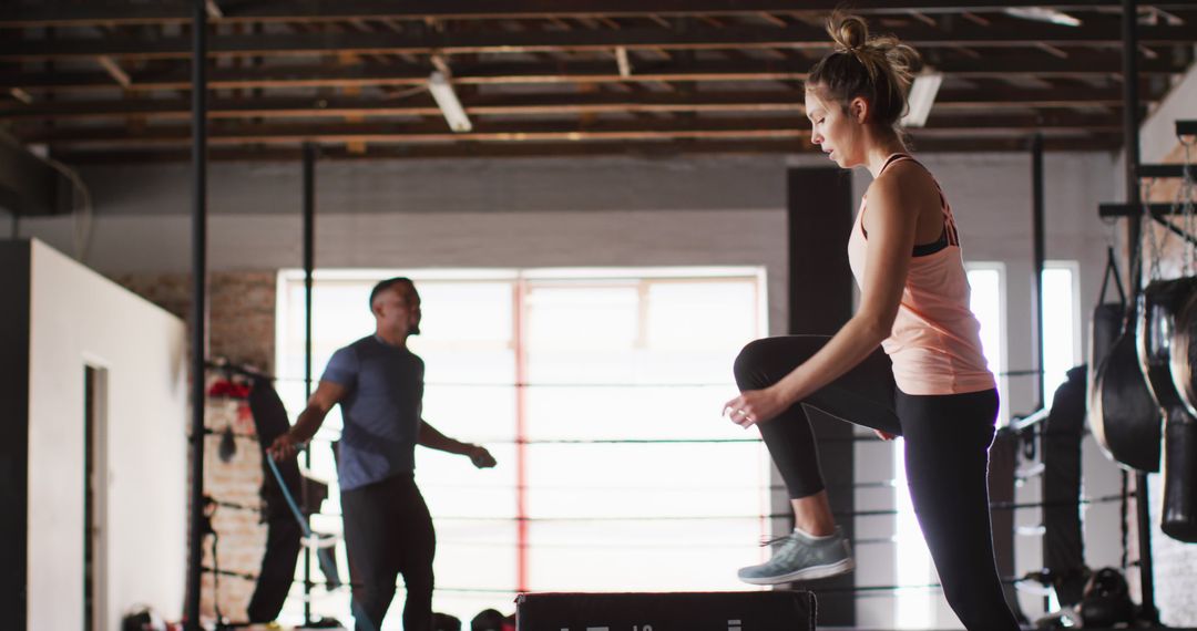 Two People Exercising in a Gym Training Together - Free Images, Stock Photos and Pictures on Pikwizard.com