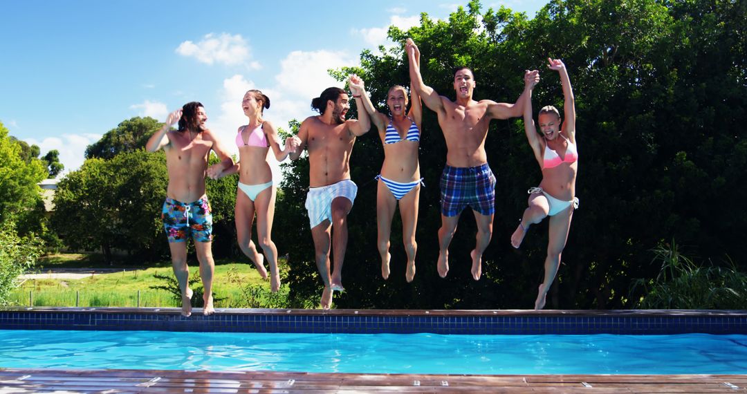 Joyful young adults leap into a pool under a clear blue sky, embodying summer energy. - Free Images, Stock Photos and Pictures on Pikwizard.com