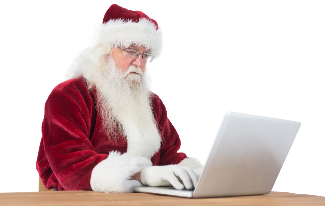 Transparent Santa Claus Using Laptop at Desk, Merry Holiday Theme - Download Free Stock Images Pikwizard.com